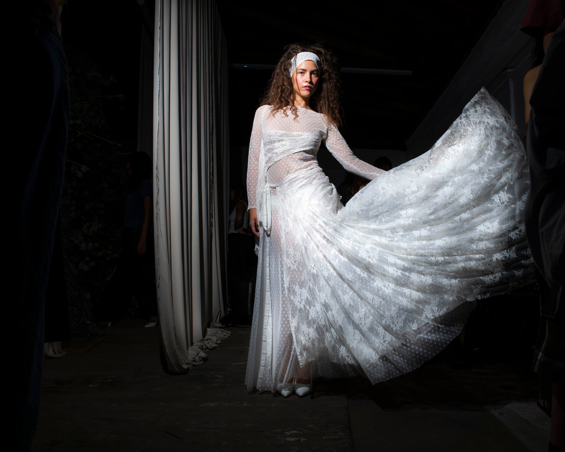Ella Mae SS26 — sheer lace gown in motion