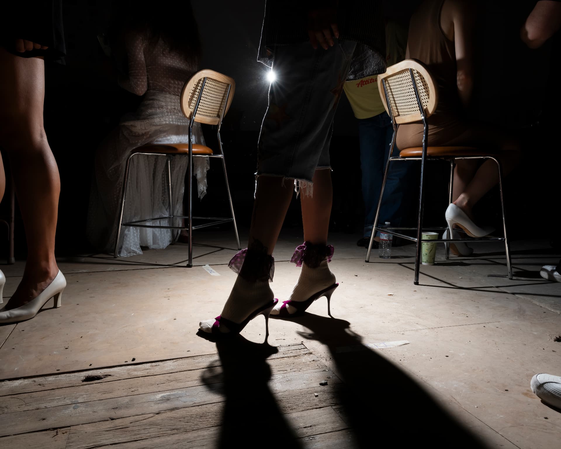 Ella Mae SS26 — heels and chairs backstage