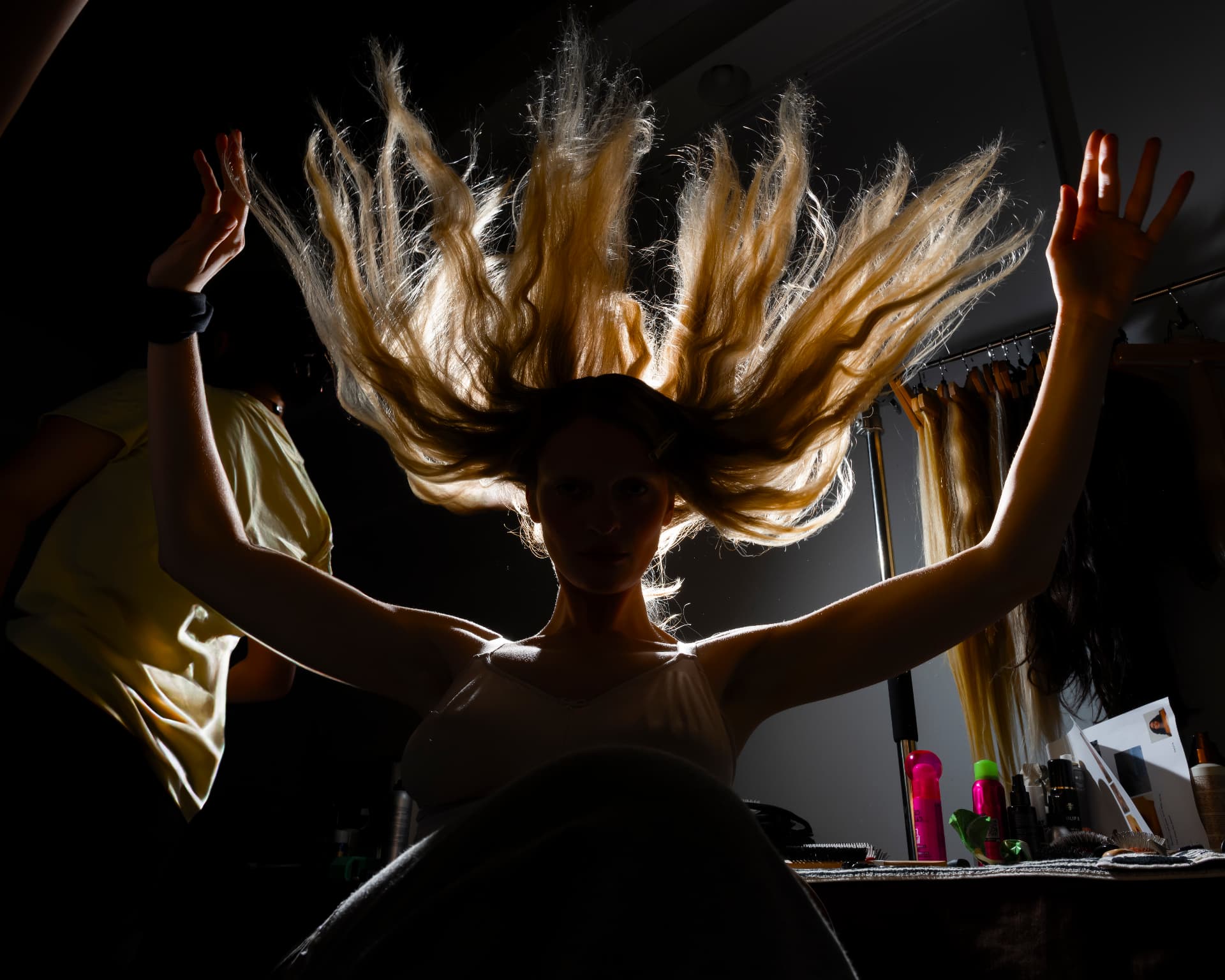 Ella Mae SS26 — hair thrown up in the mirror light