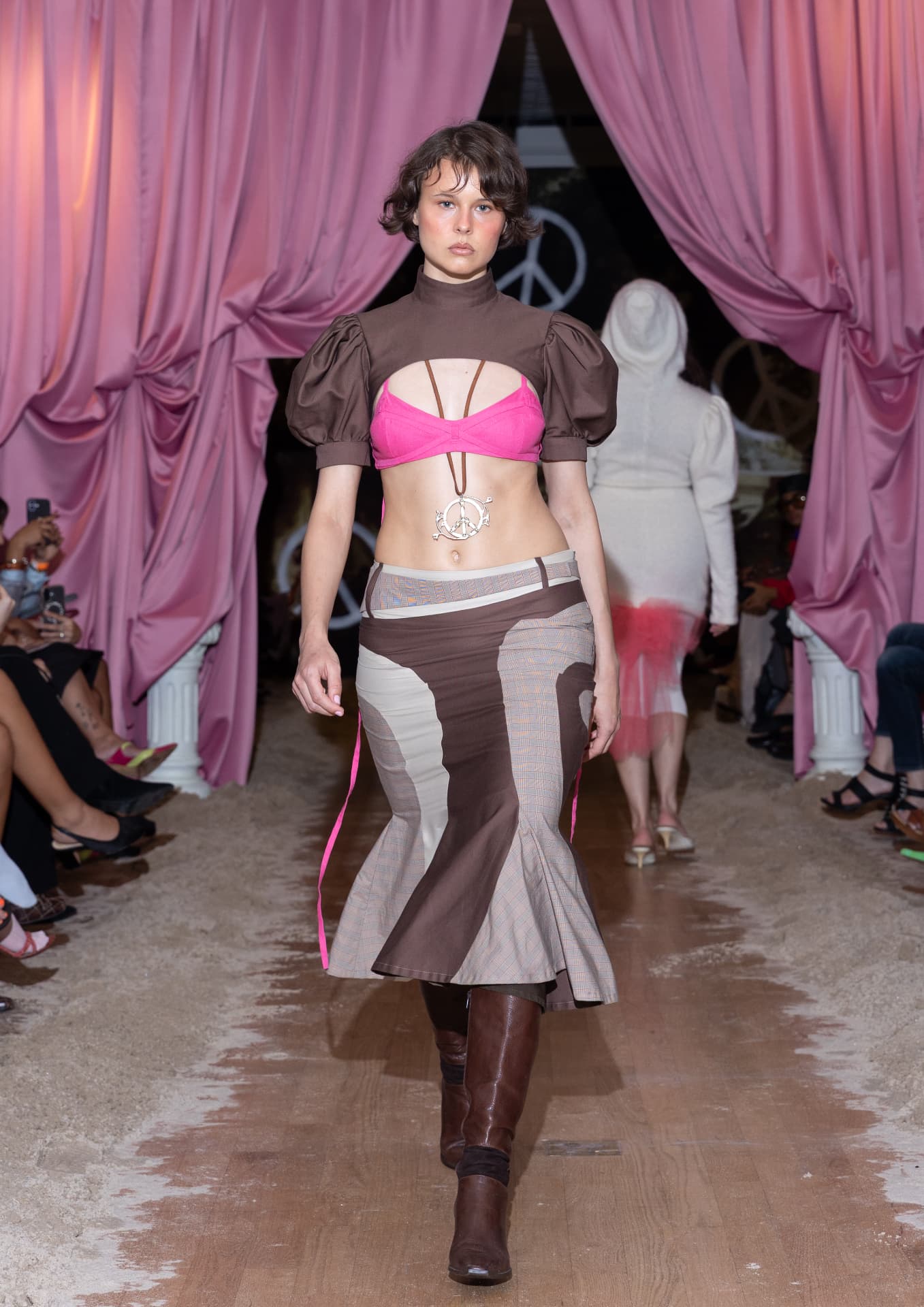 Ella Mae SS27 — brown bolero with a patchwork mermaid skirt and hot pink bikini top