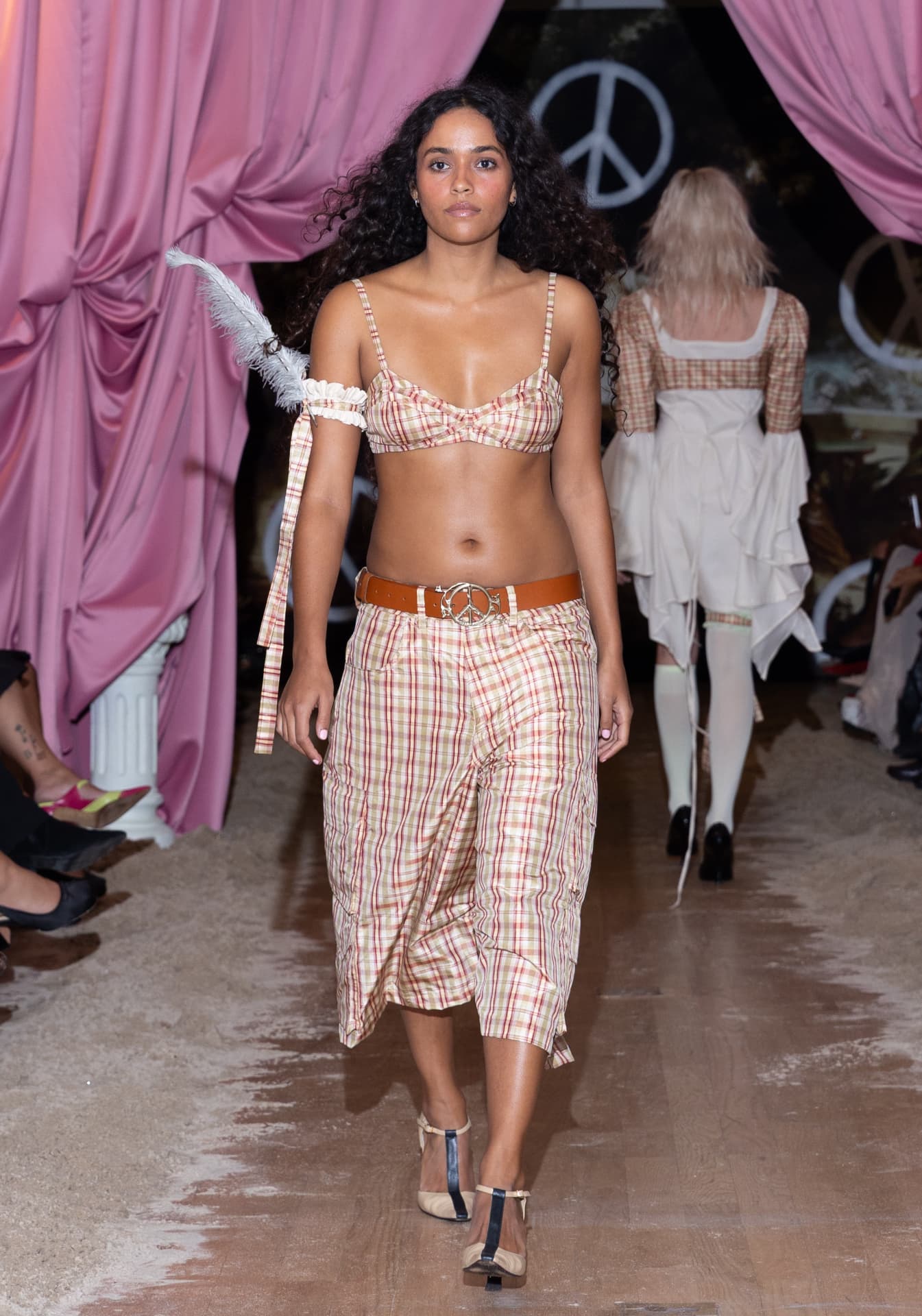 Ella Mae SS27 — plaid bikini top and matching shorts with a peace-sign belt