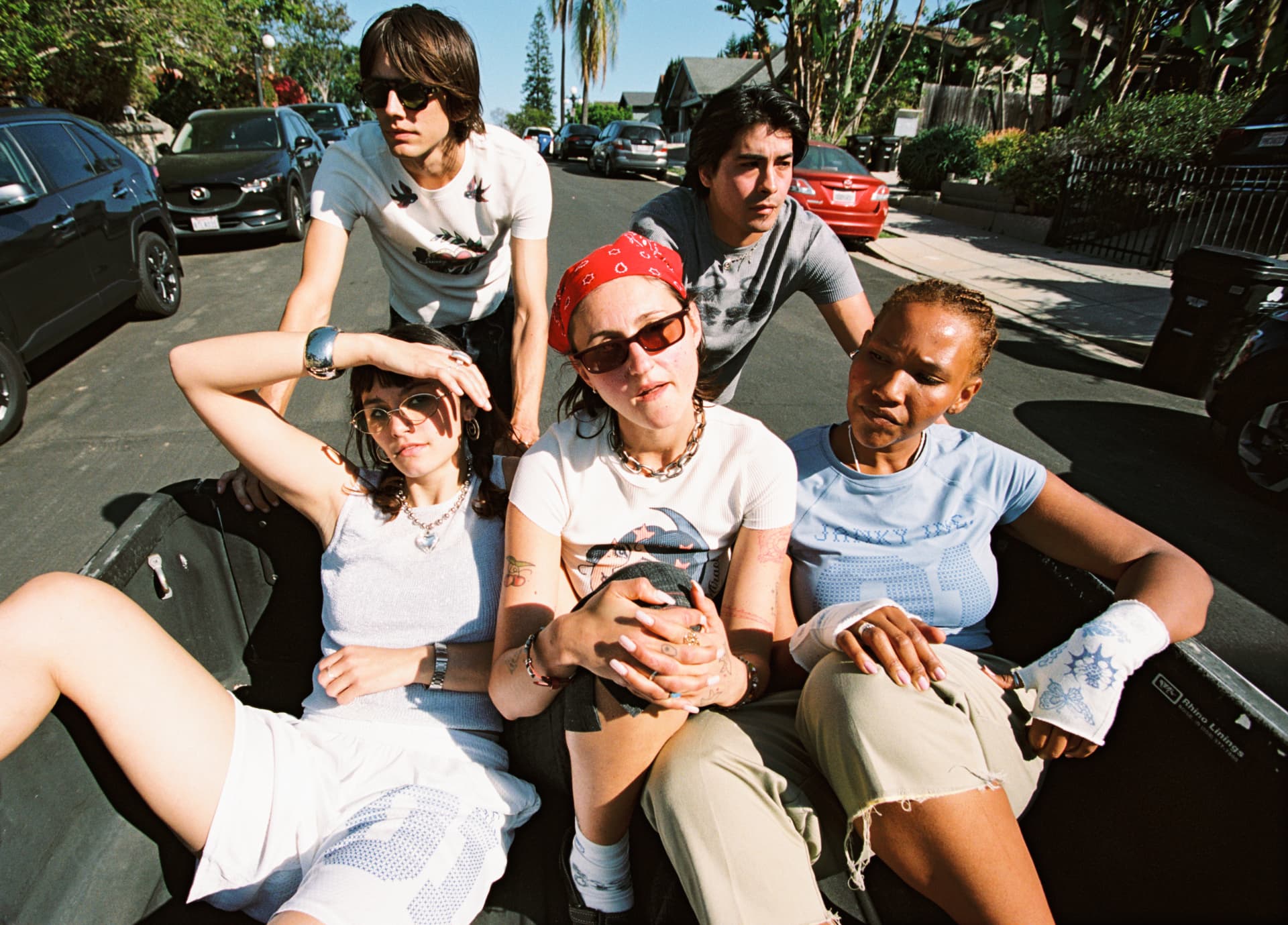 Janky Inc. SS25 — five friends posing in the bed of a truck
